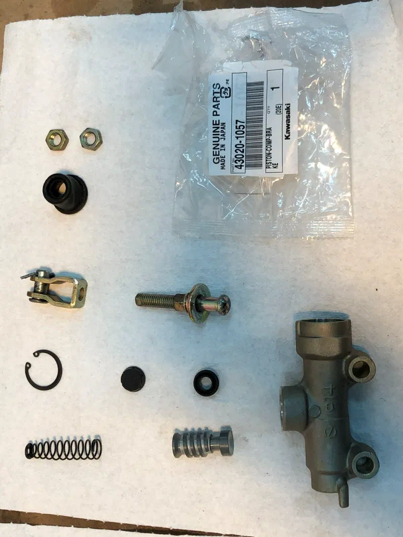 Rear brake master cylinder parts, with new seals