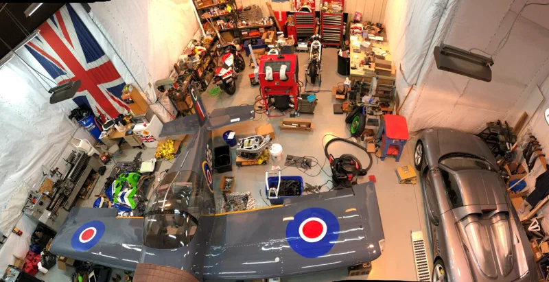 Parts everywhere, with the engine in the frame in the middle