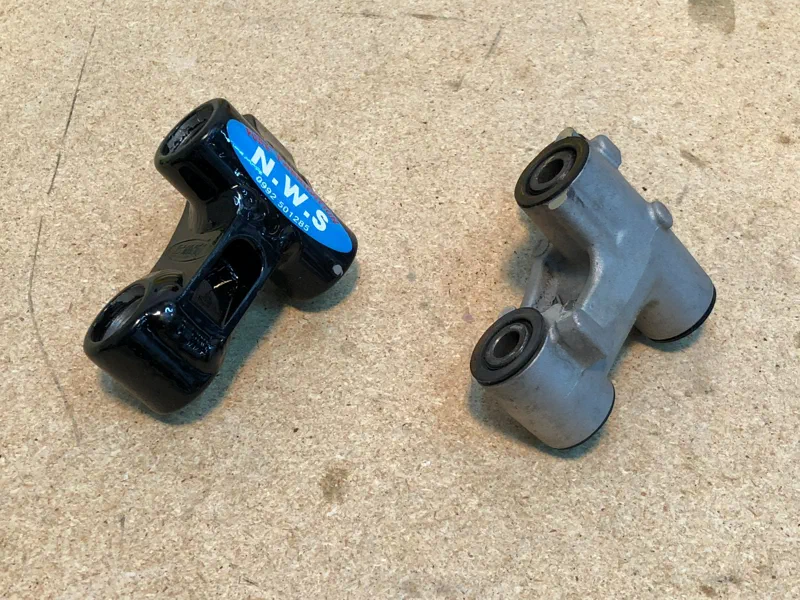 The two rear suspension rockers