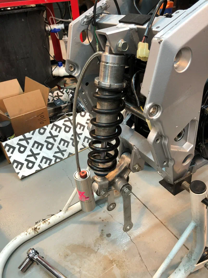 The Fox rear shock going in