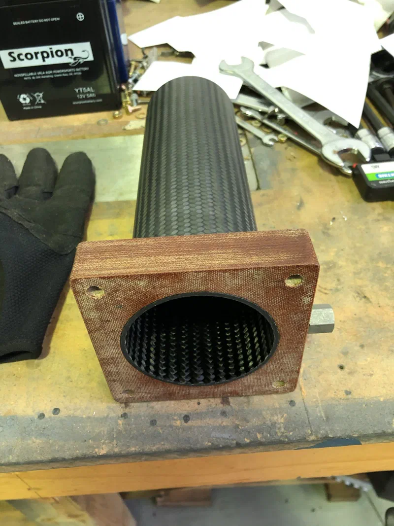 The carbon fibre extension with its phenolic flange